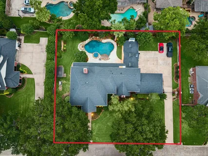 an aerial view of house with outdoor space