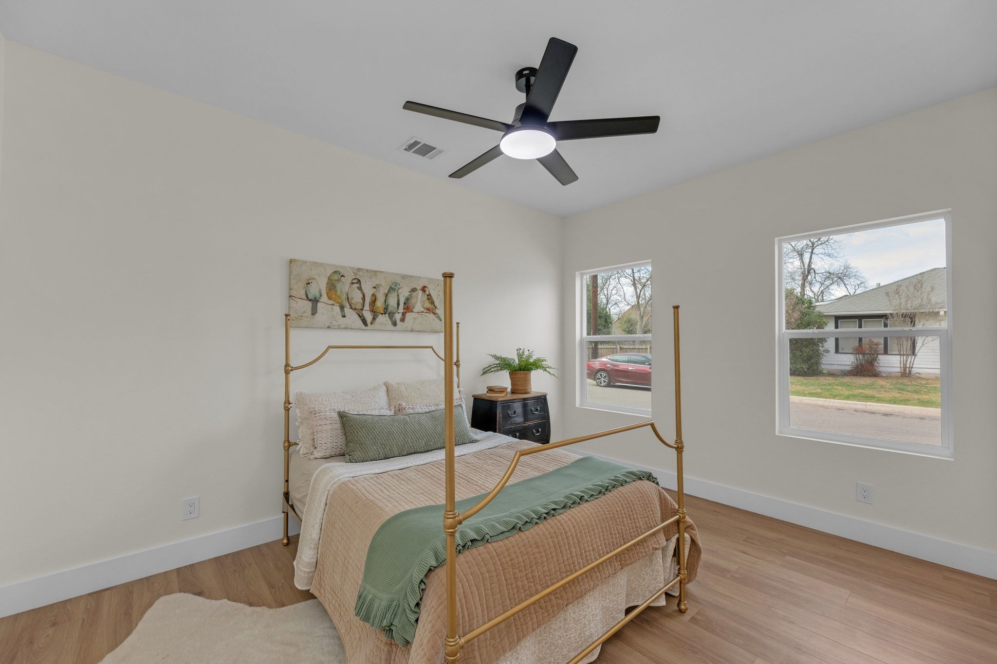 2102 South Church Street Georgetown, TX 78626 - Photo 18 of 40 one of 3 additional bedrooms in main house with ceiling fan, connects to Jack and Jill bathroom and closets.