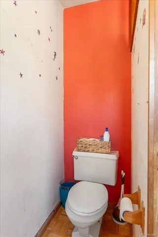 a bedroom with a bed and flat screen tv