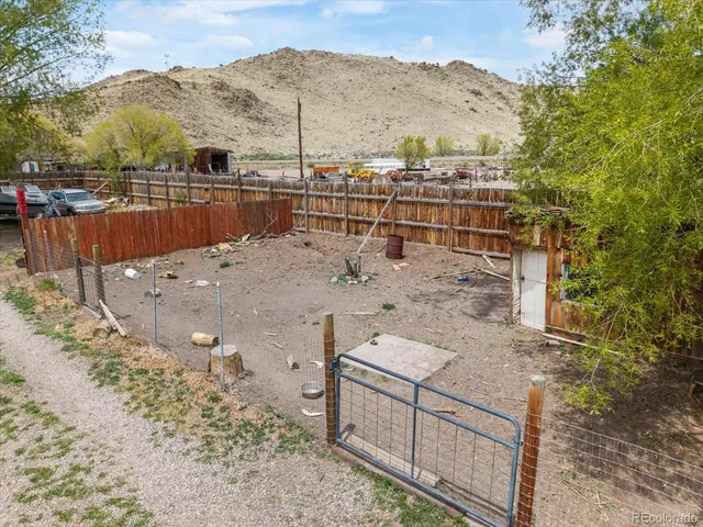 a front view of a house with trees