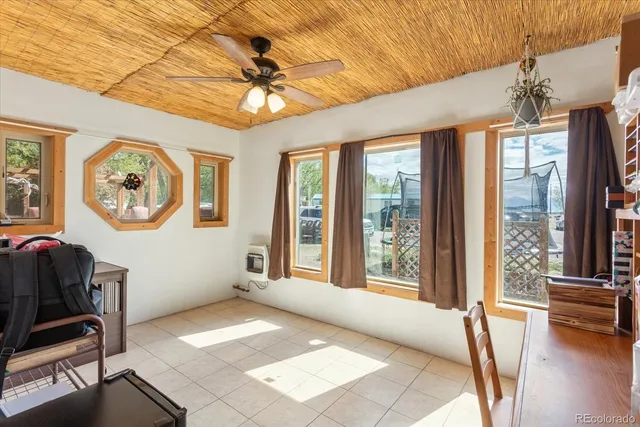 a room with furniture a washer and dryer