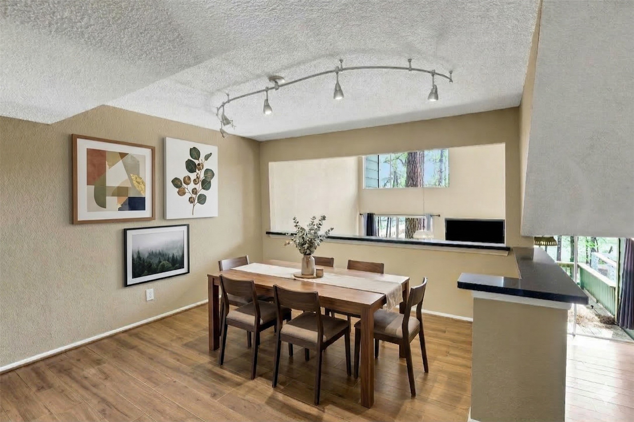 178 Villa Way Coldspring, TX 77331 - Photo 13 of 43 a view of a dining room with furniture and wooden floor