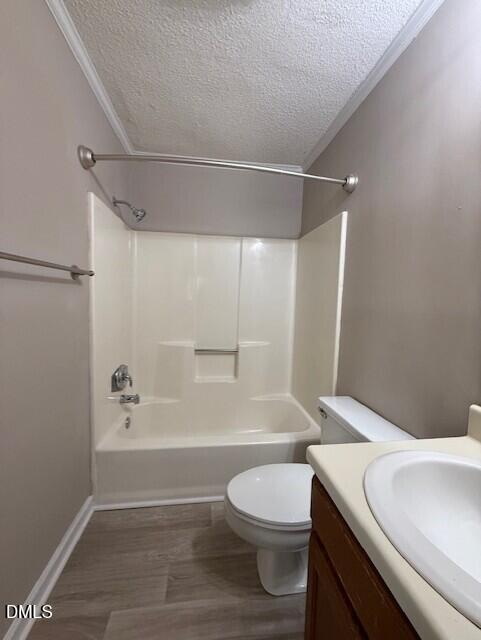 4651 Timbermill Court, Unit 201 Raleigh, NC 27612 - Photo 12 of 16 a bathroom with a toilet a sink and a bathtub