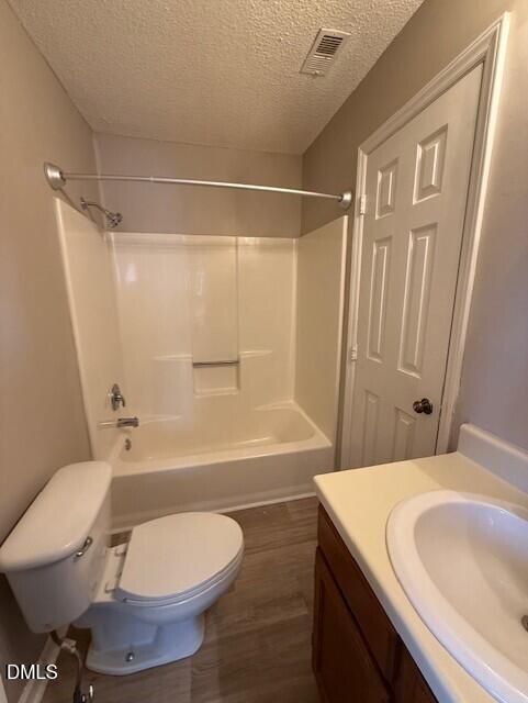 4651 Timbermill Court, Unit 201 Raleigh, NC 27612 - Photo 15 of 16 a bathroom with a sink toilet and shower