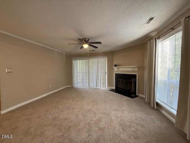 4651 Timbermill Court, Unit 201 Raleigh, NC 27612 - Photo 2 of 16 an empty room with windows and fireplace