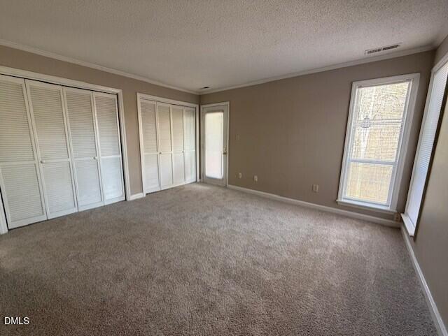 4651 Timbermill Court, Unit 201 Raleigh, NC 27612 - Photo 8 of 16 a view of an empty room with a window
