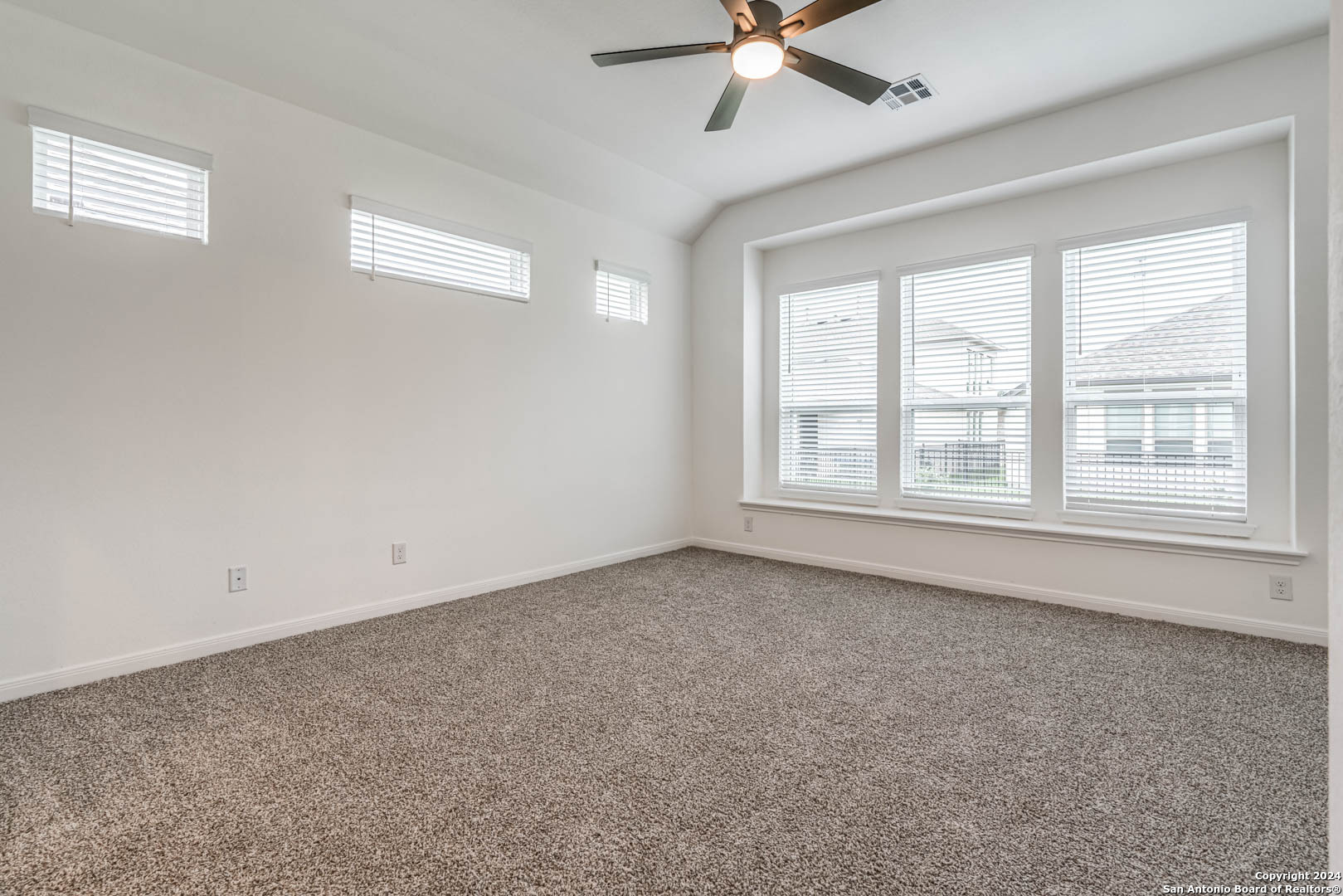 113 Valencia Boerne, TX 78006 - Photo 23 of 43 a view of an empty room with a window