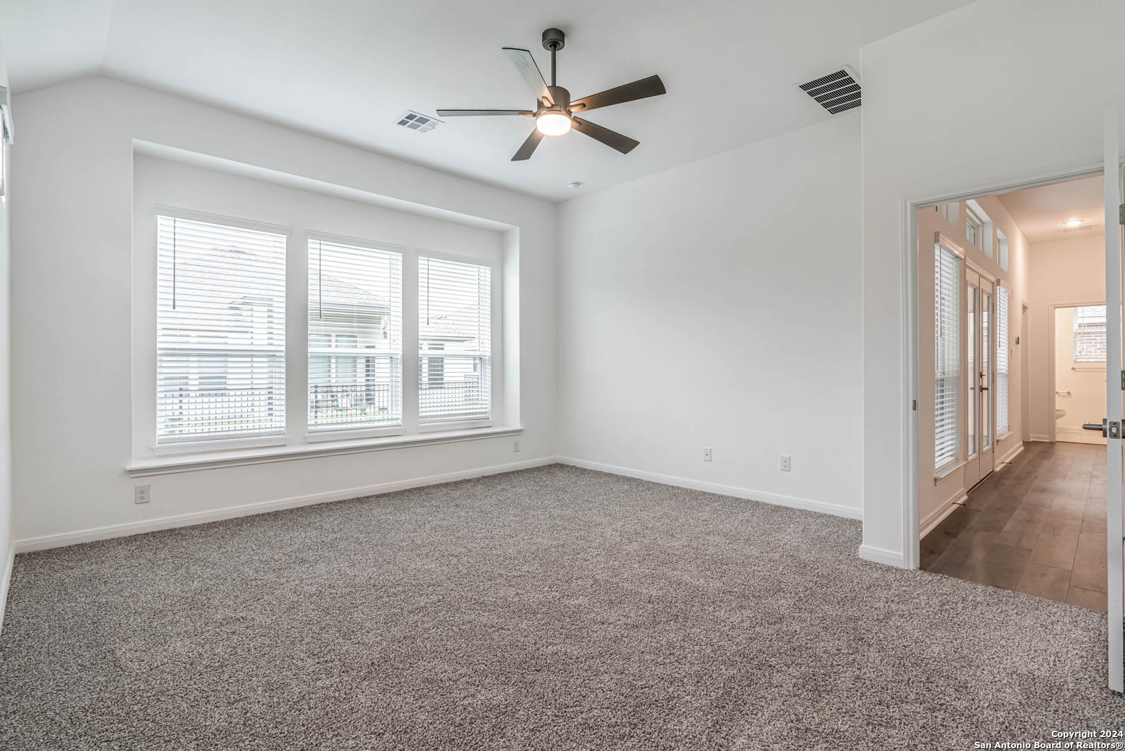 113 Valencia Boerne, TX 78006 - Photo 24 of 43 a view of an empty room with a window