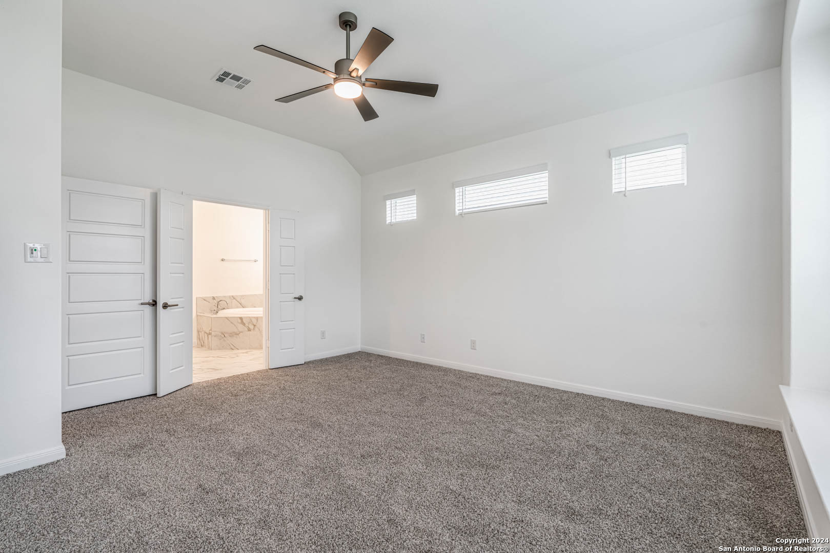 113 Valencia Boerne, TX 78006 - Photo 25 of 43 an empty room with closet and windows