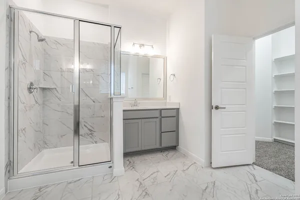 a view of an empty walk in closet