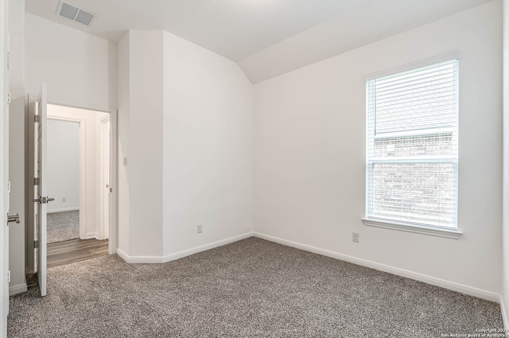113 Valencia Boerne, TX 78006 - Photo 31 of 43 an empty room with a window