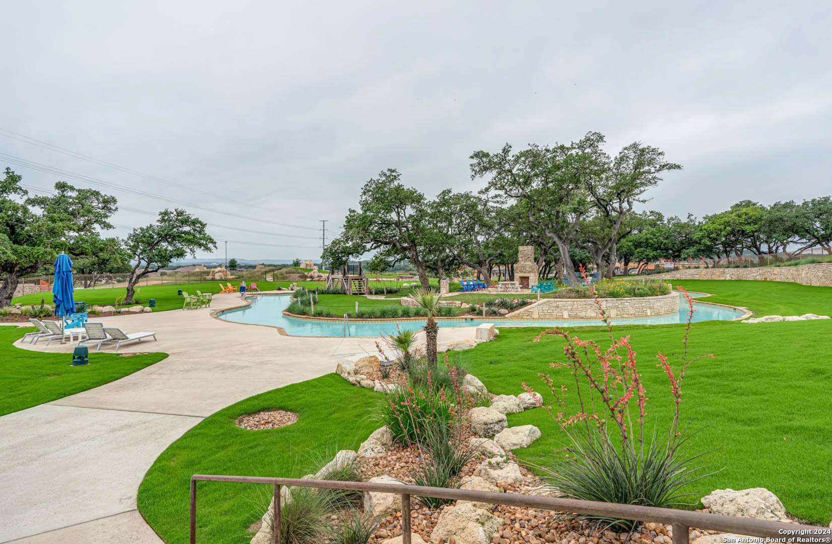 113 Valencia Boerne, TX 78006 - Photo 41 of 43 a view of a golf course with a lake view