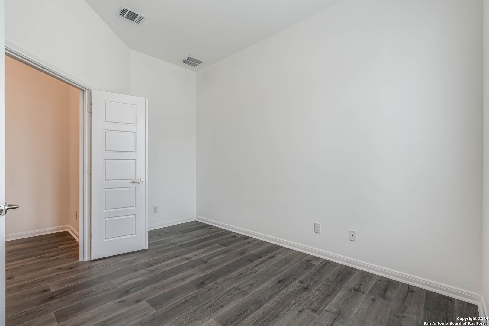 113 Valencia Boerne, TX 78006 - Photo 8 of 43 a view of an empty room with wooden floor