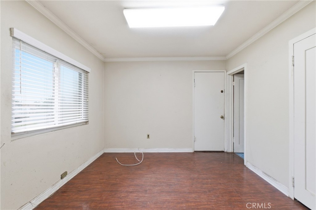 456 West Bennett Street Compton, CA 90220 - Photo 5 of 13 a view of an empty room with a window