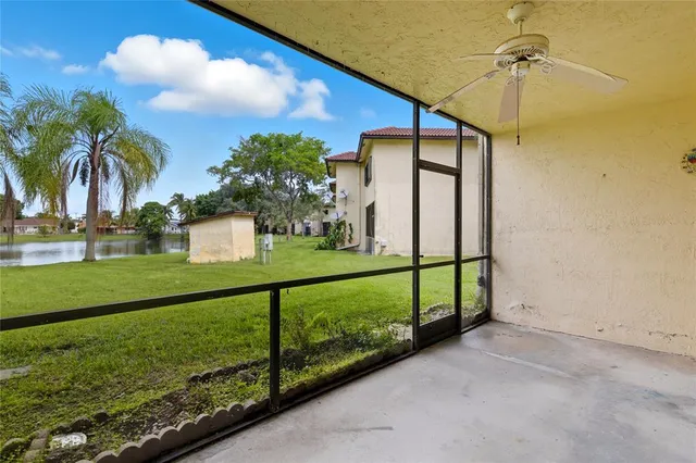 a view of a park with palm trees