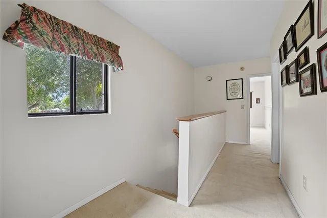 a view of a hallway with closet area