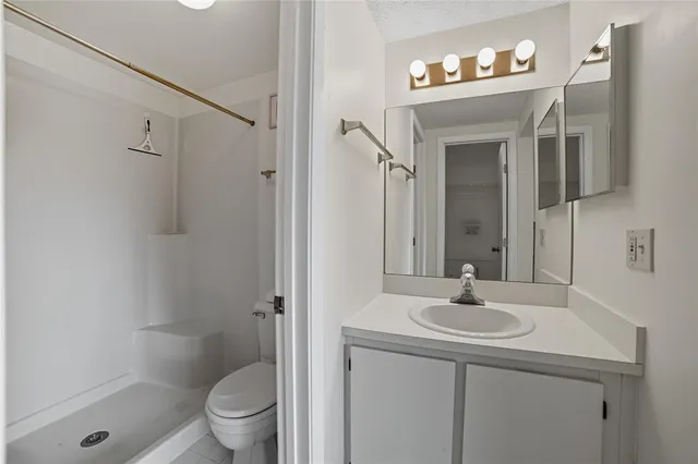 a view of a livingroom with shelves