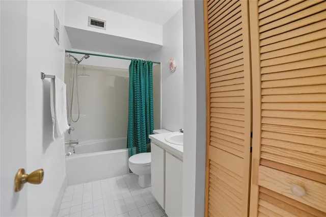 a view of empty room with shelves