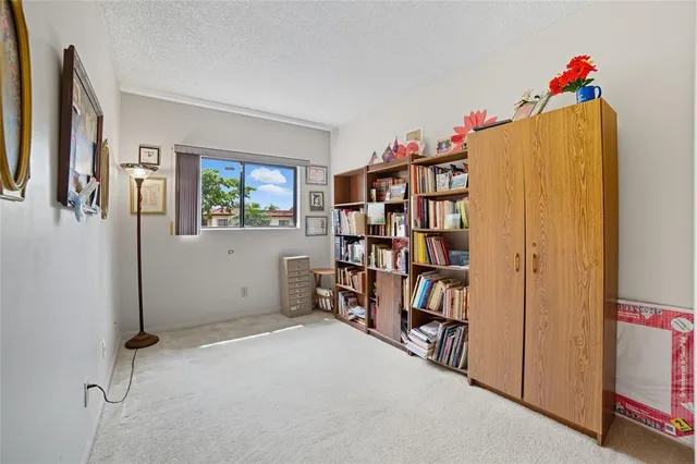 a view of a room that has a window