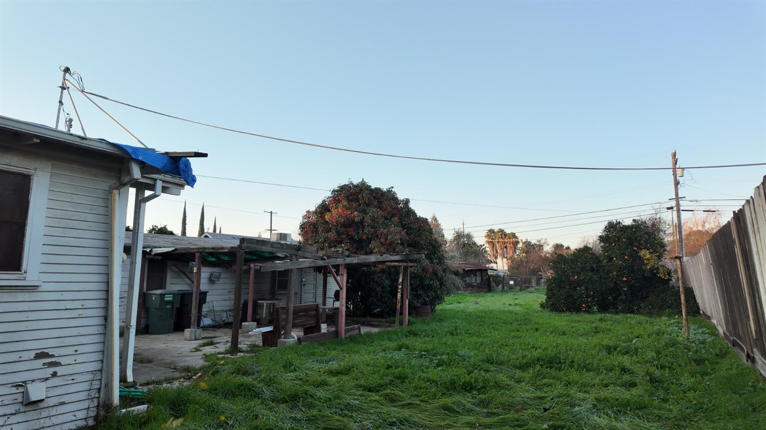 430 Laurel Avenue Modesto, CA 95351 - Photo 6 of 6 a view of a house with a yard and deck