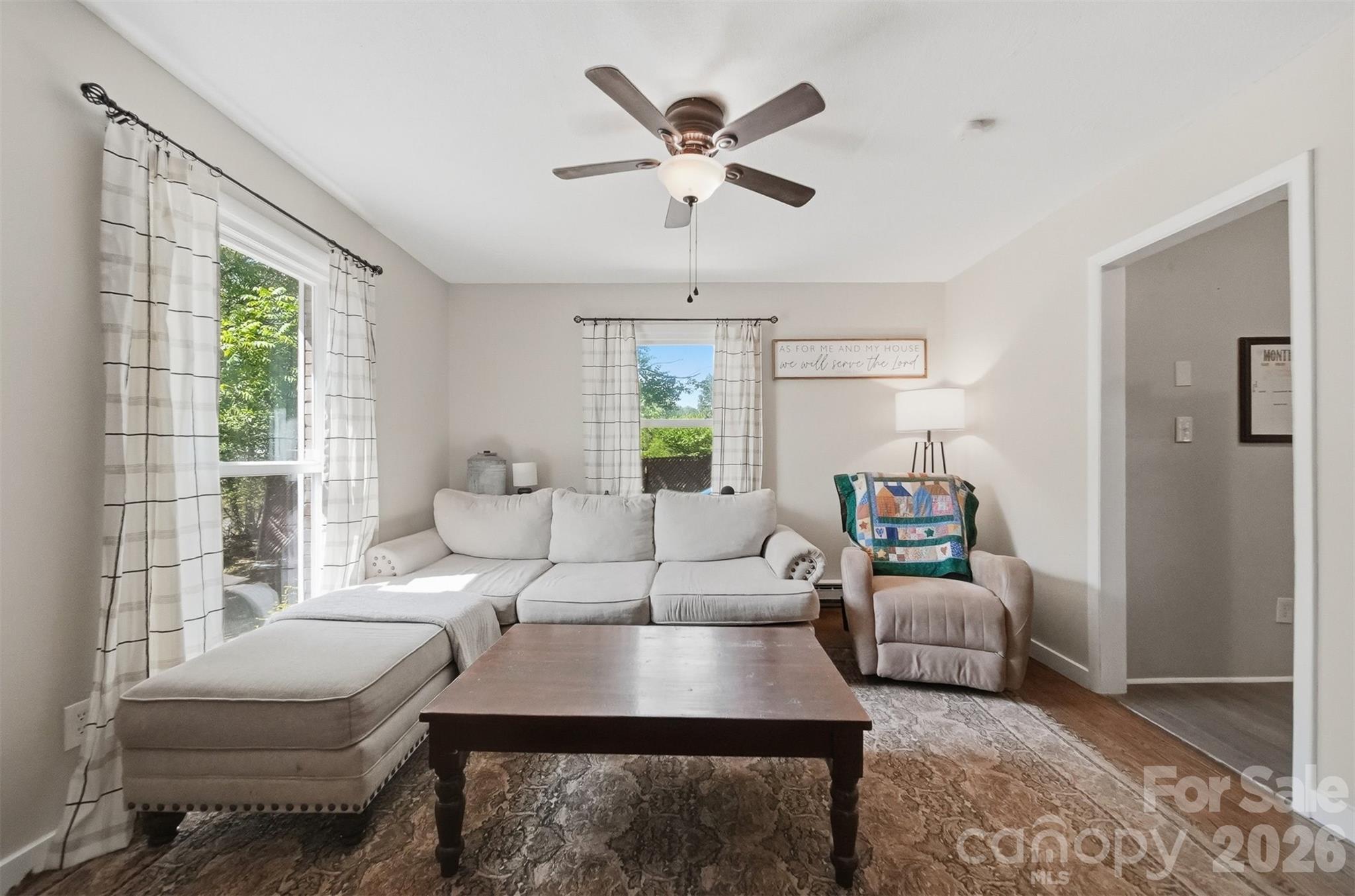 1312 County Home Road Conover, NC 28613 - Photo 4 of 25 a living room with furniture and a large window