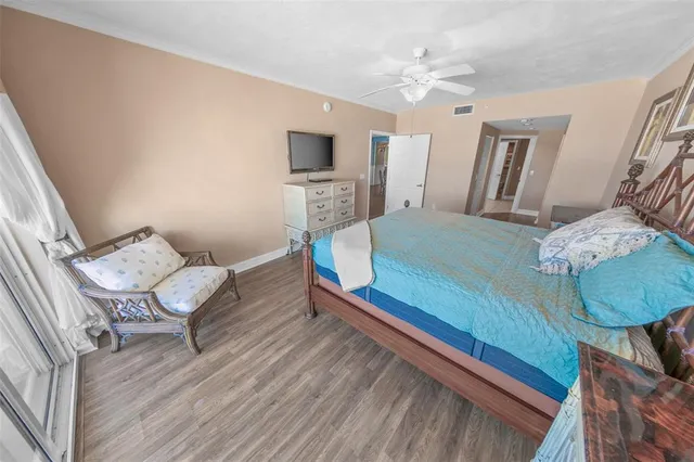 a spacious bathroom with a double vanity sink and a mirror