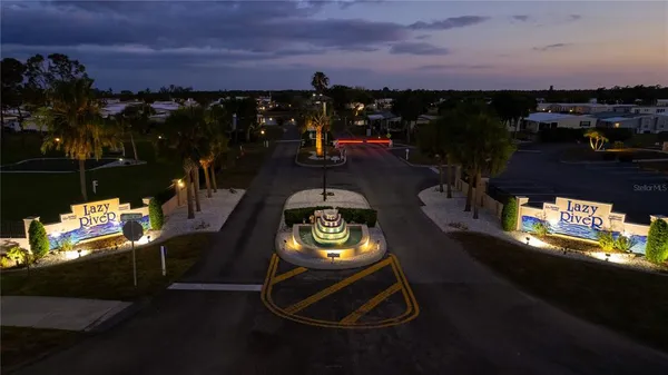 a view of a lake with houses