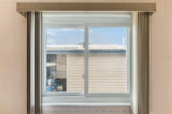 a view of a hallway with a couch
