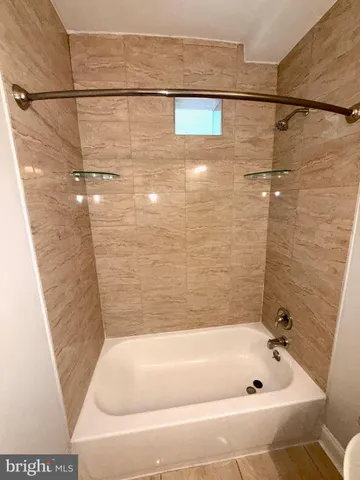 a bathroom with a bathtub