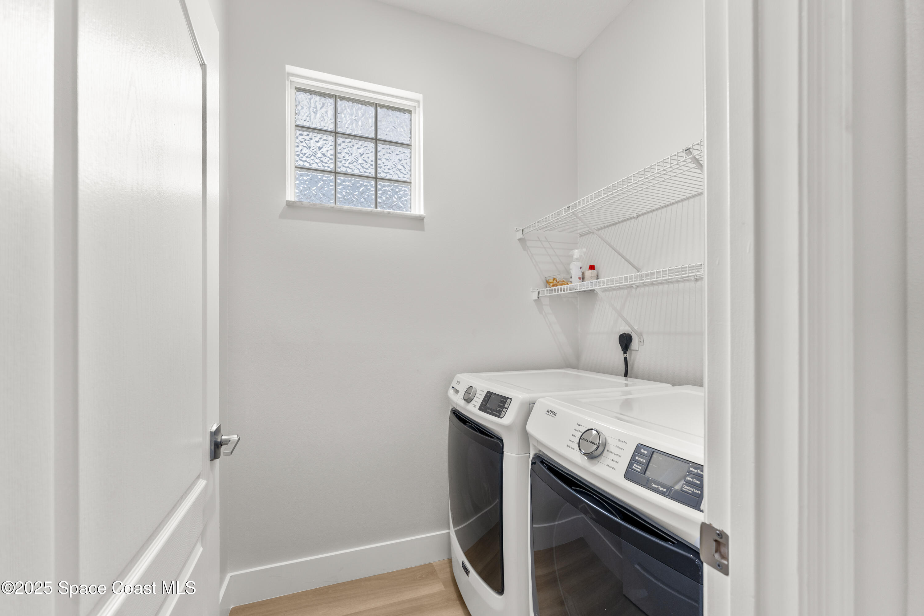 3053 Jacobaeus Lane Indialantic, FL 32903 - Photo 18 of 35 a utility room with dryer and washer
