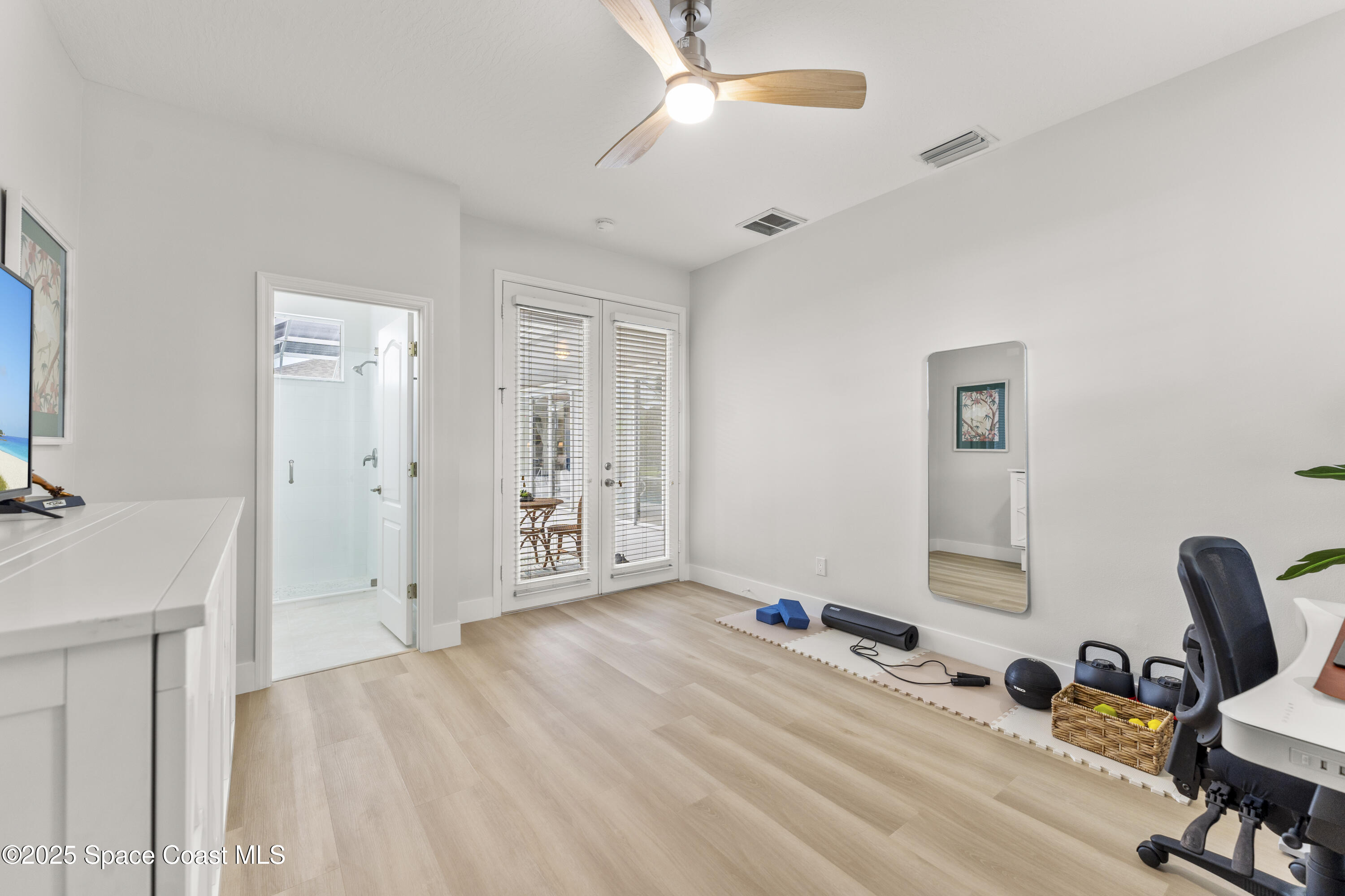 3053 Jacobaeus Lane Indialantic, FL 32903 - Photo 25 of 35 a view of a workspace with furniture and a window