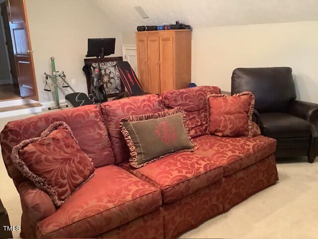 2125 Keith Hills Road Lillington, NC 27546 - Photo 57 of 66 a large bedroom with a bed and flat screen tv