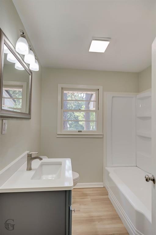 809 Horton Street Minden, LA 71055 - Photo 17 of 20 a bathroom with a sink and a bathtub