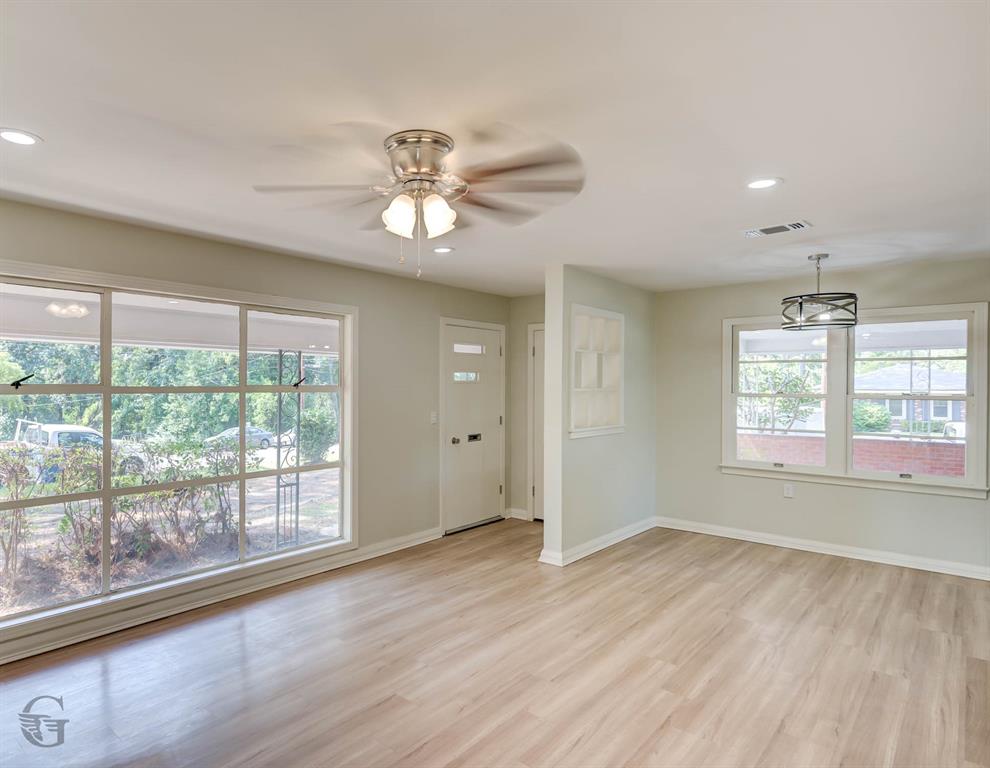 809 Horton Street Minden, LA 71055 - Photo 10 of 20 a view of empty room with wooden floor and fan