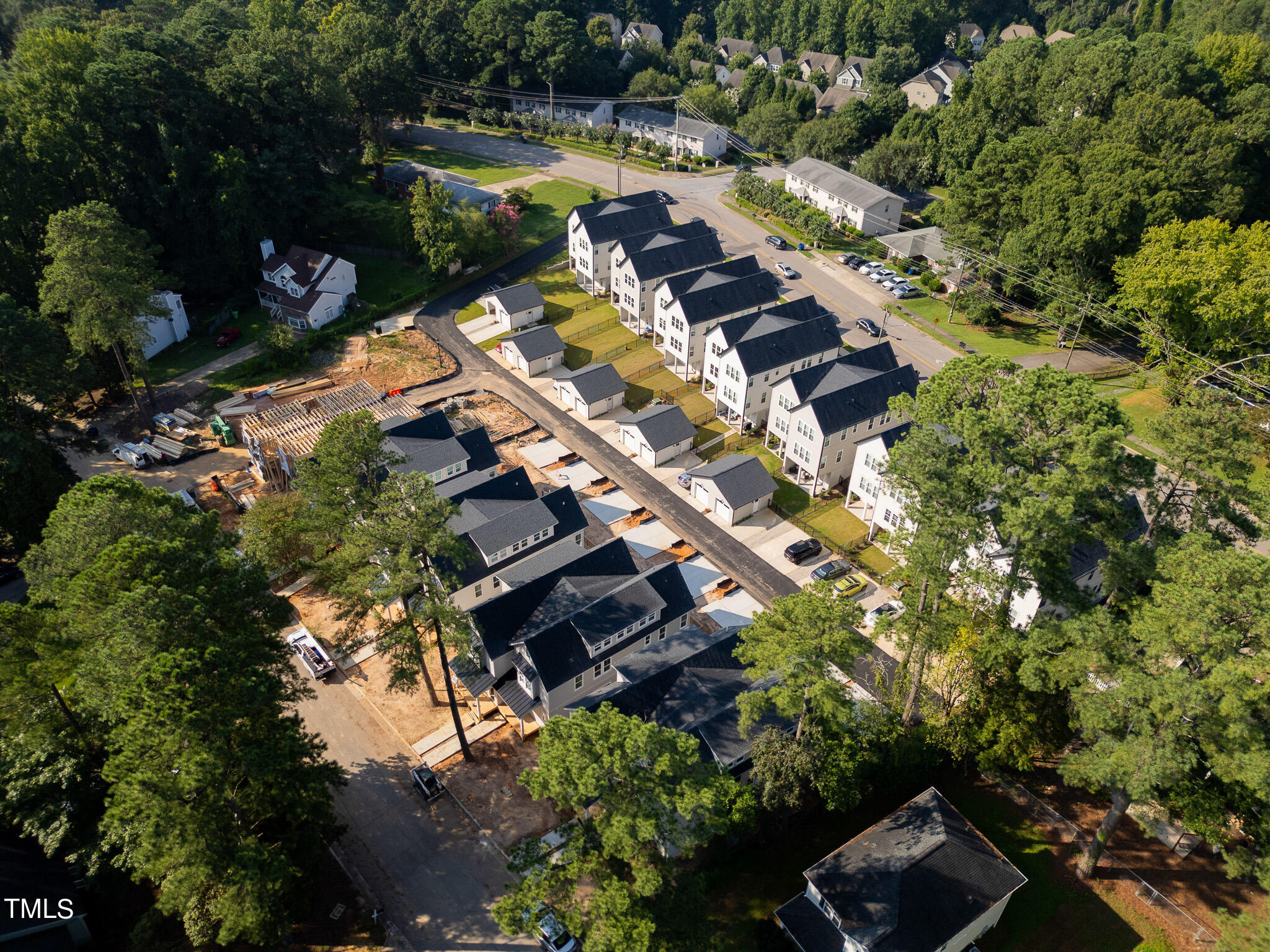 857 Athens Drive, Unit 101 Raleigh, NC 27606 - Photo 48 of 57 an aerial view of a house with a yard basket ball court and outdoor seating