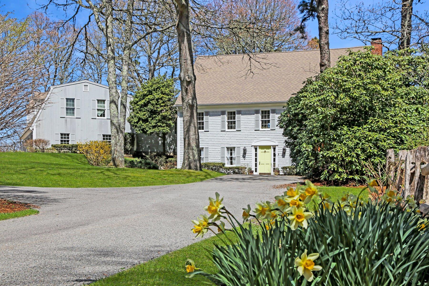 7 Portside Lane Orleans, MA 02653 - Photo 13 of 34 a view of a white house with a big yard and large trees