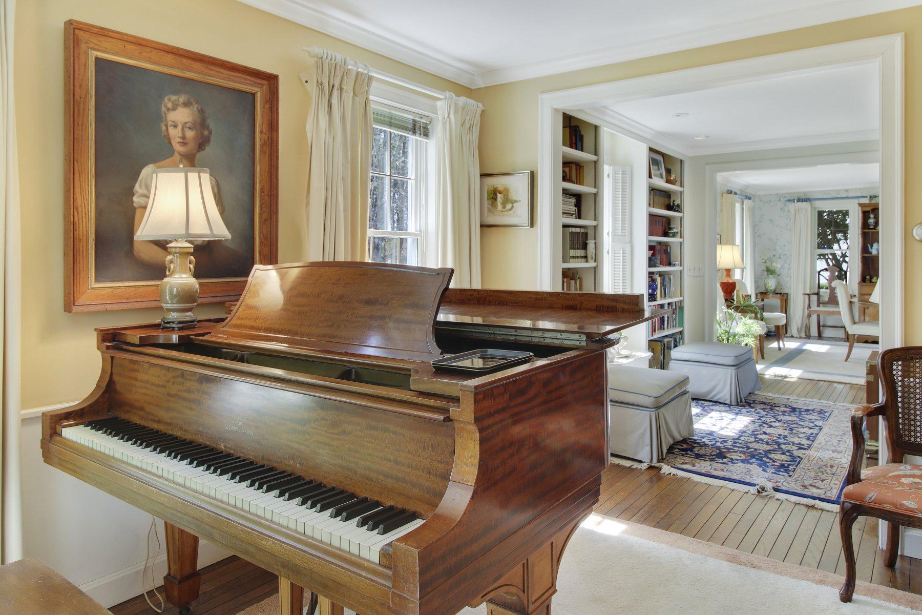 7 Portside Lane Orleans, MA 02653 - Photo 19 of 34 a living room with furniture and a piano