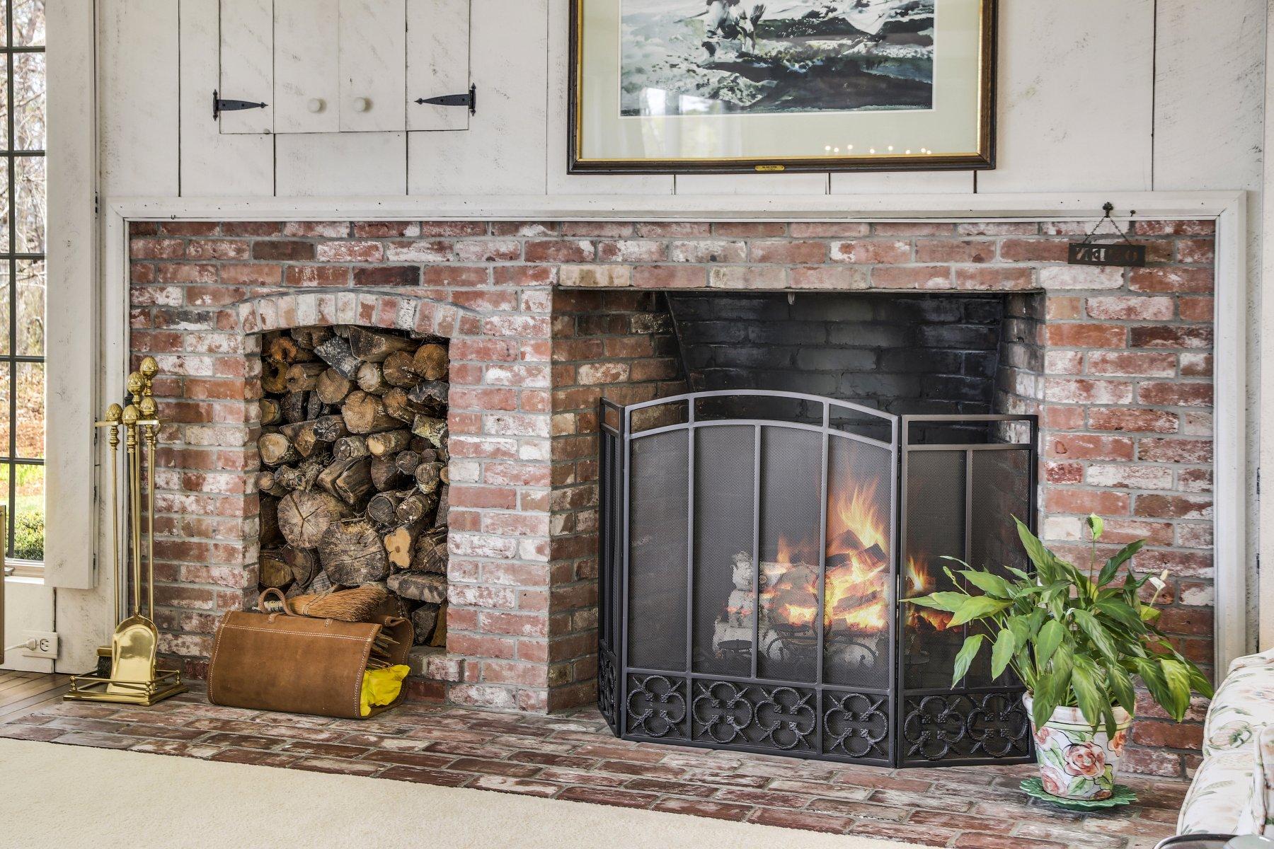 7 Portside Lane Orleans, MA 02653 - Photo 20 of 34 a view of a fireplace with wooden floor