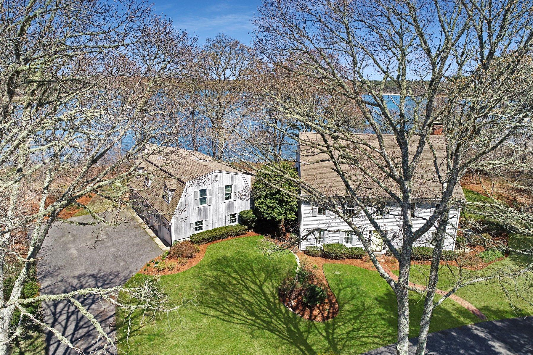 7 Portside Lane Orleans, MA 02653 - Photo 2 of 34 a aerial view of a house with a yard and large trees