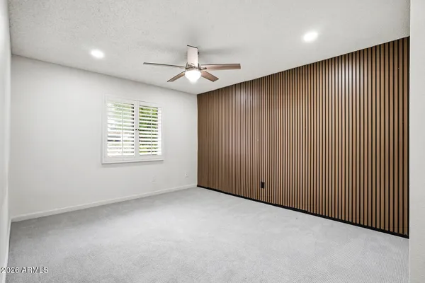 a view of a livingroom with a ceiling fan