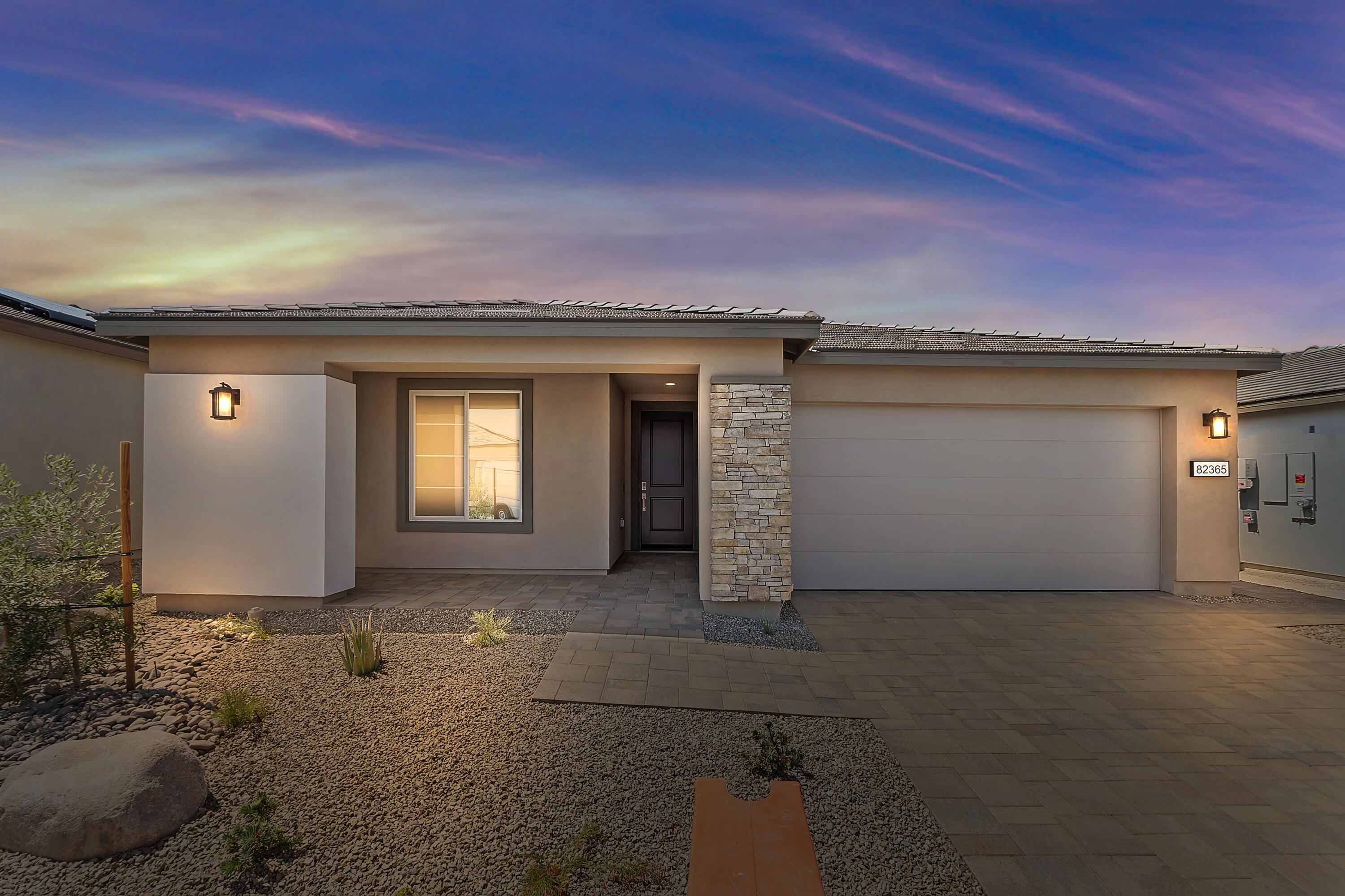 82365 Murray Canyon Drive, Unit LT#8199 Indio, CA 92201 - Photo 20 of 39 a view of a house with backyard and garage