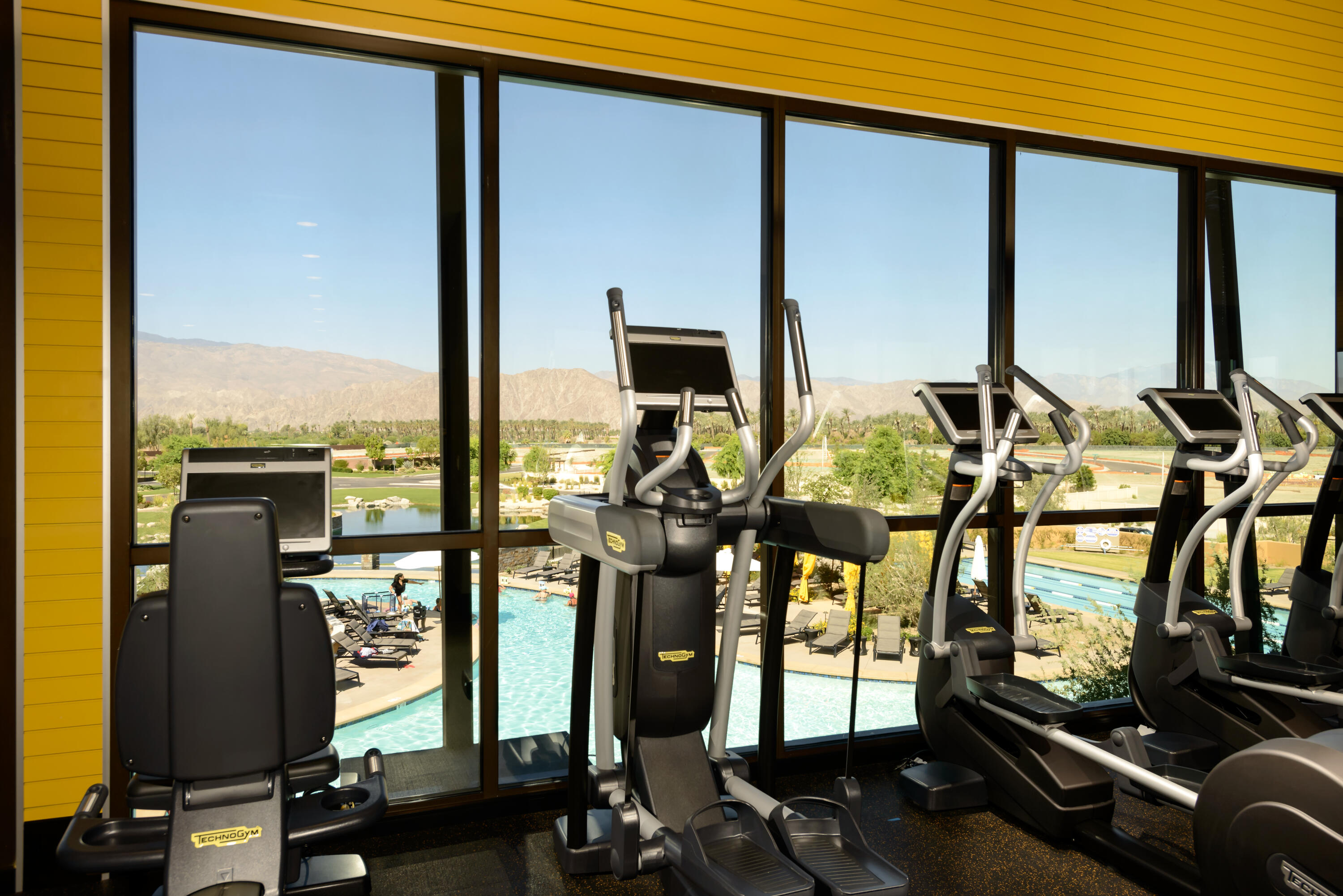 82365 Murray Canyon Drive, Unit LT#8199 Indio, CA 92201 - Photo 32 of 39 a view of a room with gym equipment