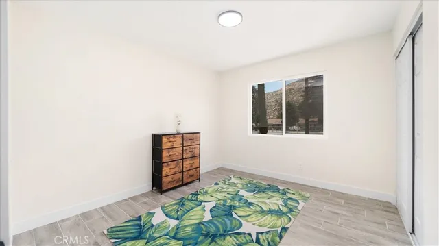a bathroom with a sink a mirror and shower