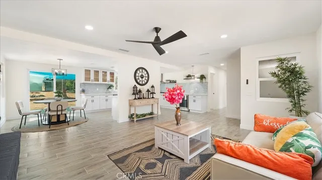 a living room with furniture and a table