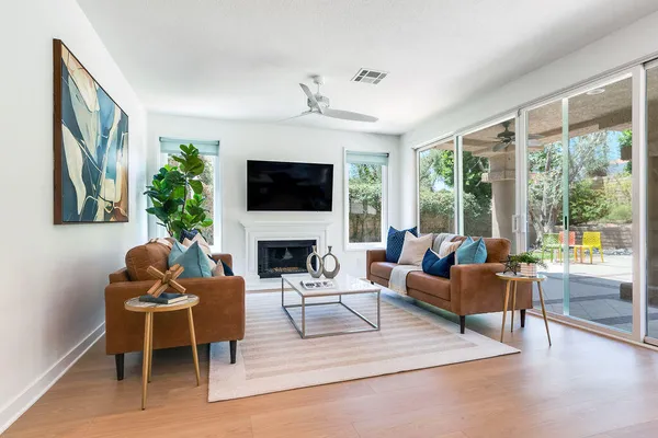 a kitchen with white cabinets