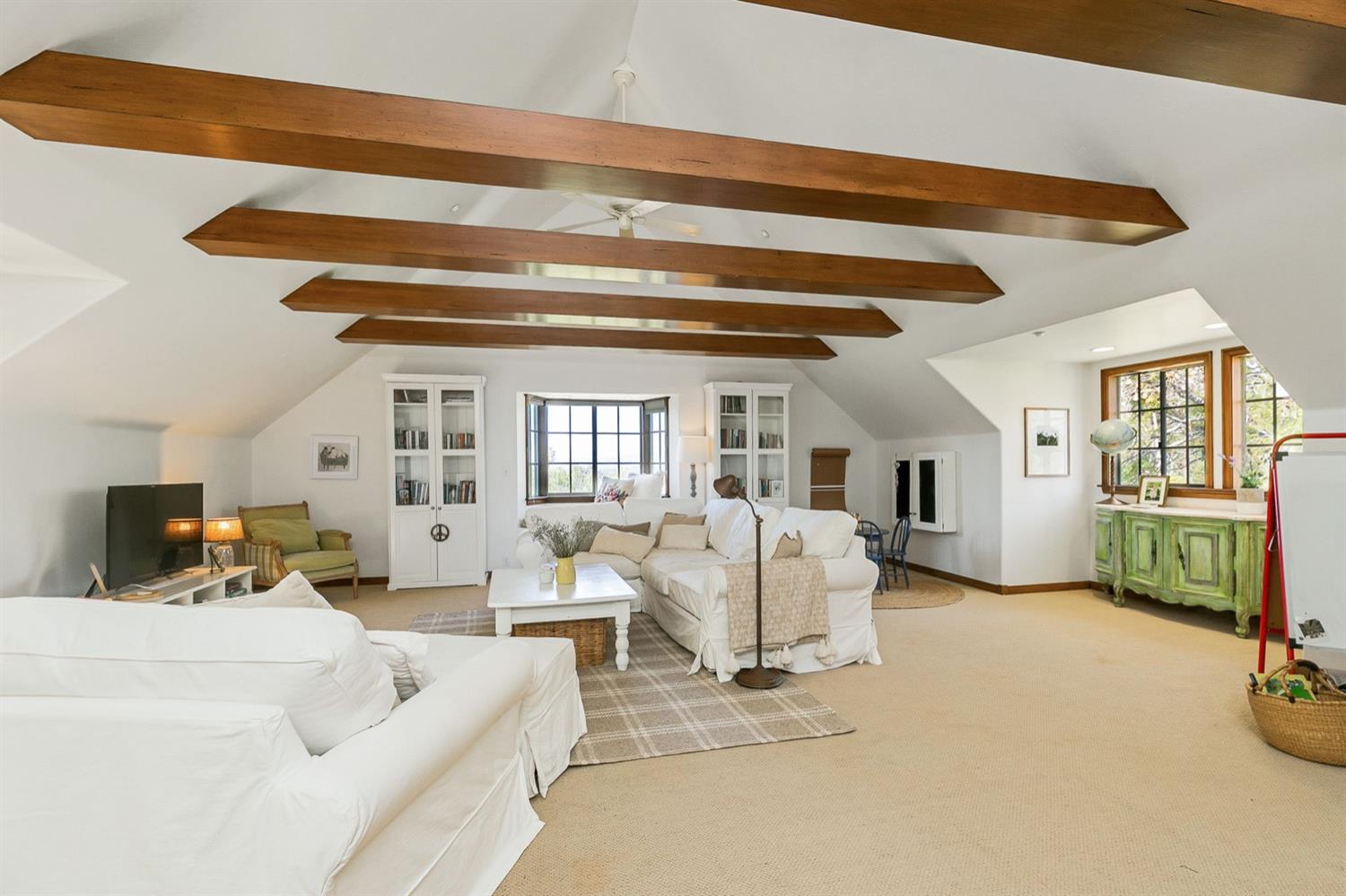 1712 Ladera Road Ojai, CA 93023 - Photo 23 of 47 a living room with furniture and a flat screen tv