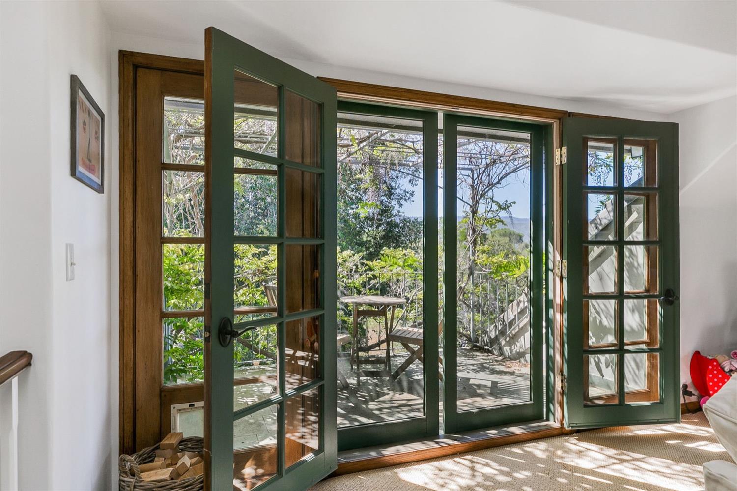 1712 Ladera Road Ojai, CA 93023 - Photo 27 of 47 a bedroom with a bed and a window
