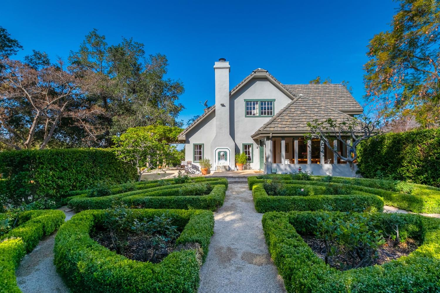 1712 Ladera Road Ojai, CA 93023 - Photo 34 of 47 a front view of a house with a garden