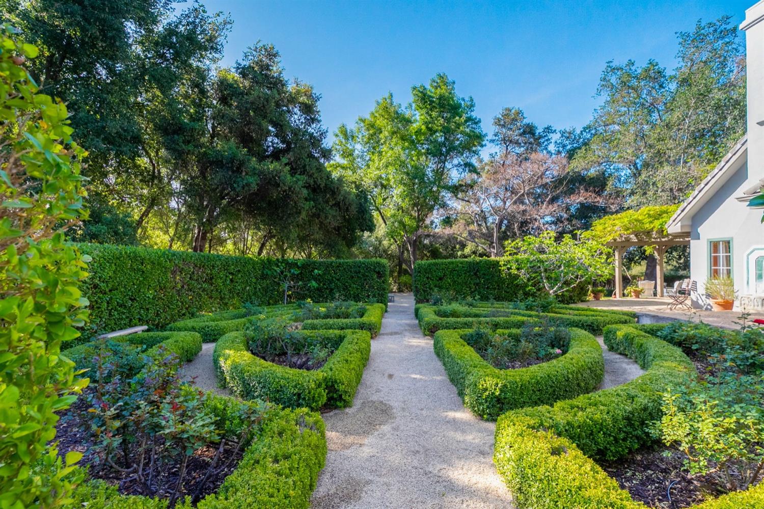1712 Ladera Road Ojai, CA 93023 - Photo 35 of 47 a view of a garden with plants and large trees