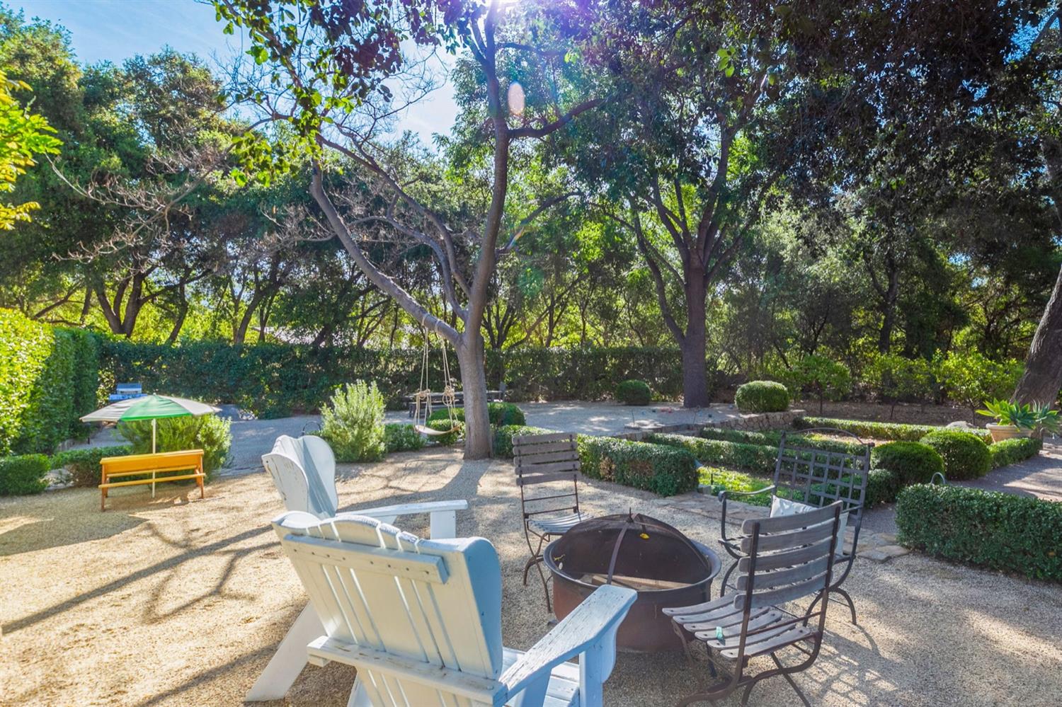 1712 Ladera Road Ojai, CA 93023 - Photo 38 of 47 a view of backyard with seating area and trees around